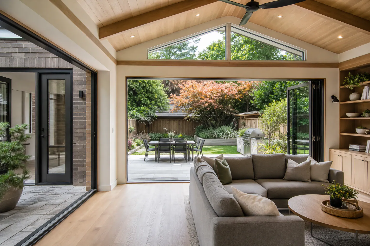 Light-filled rear family-room addition opening onto a landscaped garden
